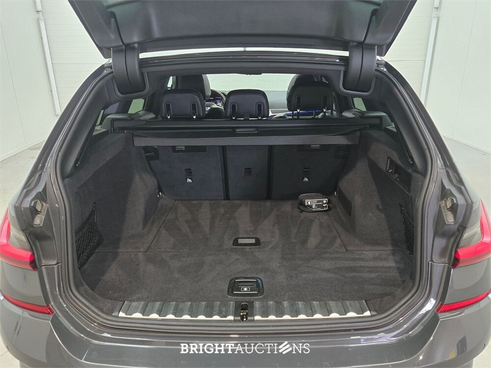 BMW M340i xDrive 3-serie Touring High Executive 375pk 2021 3-Serie, S-421-GN