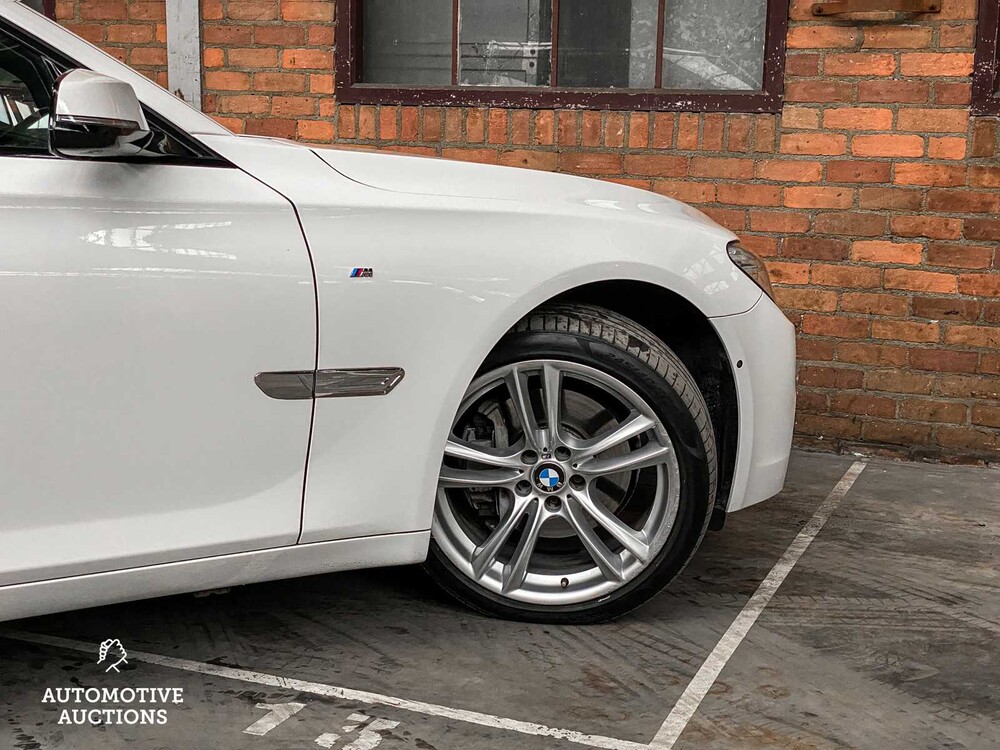 BMW ActiveHybrid7 M-Sport 3.0 L6 354hp 2014