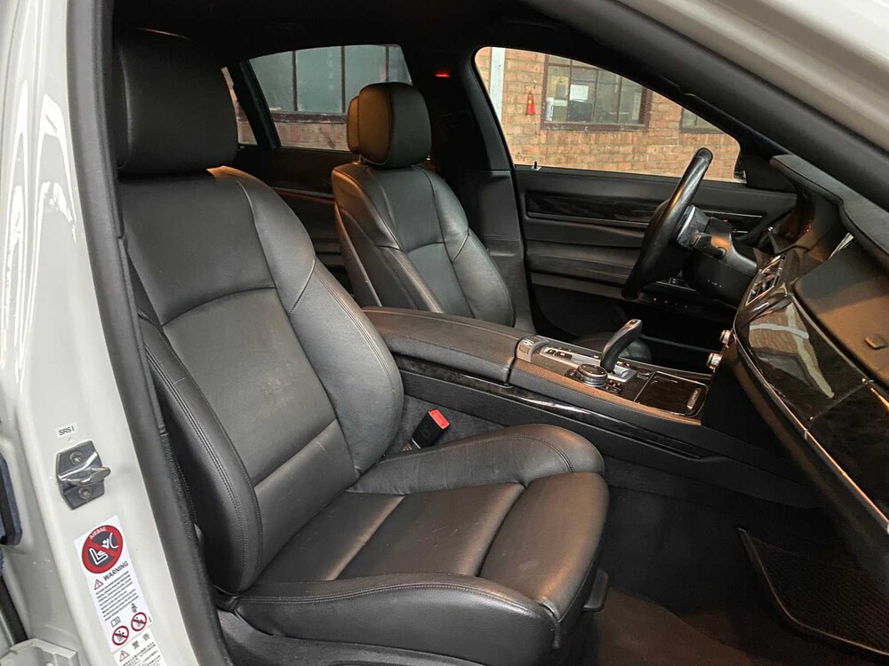 BMW ActiveHybrid7 M-Sport 3.0 L6 354hp 2014