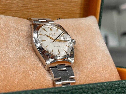 ROLEX 6694 OYSTERDATE 1960 - GOLD UND WEISSES DAIL - MIT ORIGINALVERPACKUNG UND STAHLARMBAND