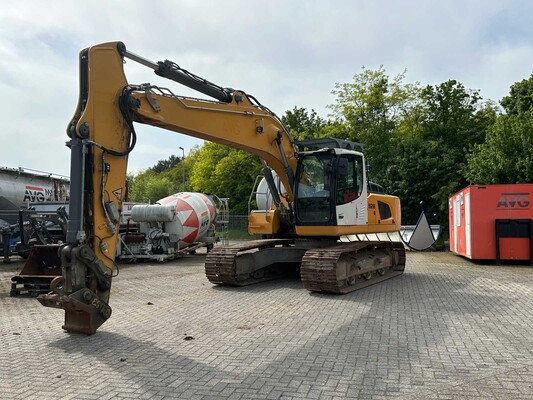 Trucks, semi-trailers and excavators in Heijen