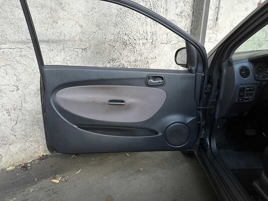 Daihatsu Cuore 1.0-12V Nagano -Automaat- 58pk 2005, 43-RT-NJ